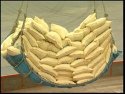 Rice aid destined for NKorea being loaded onto ship News Clip