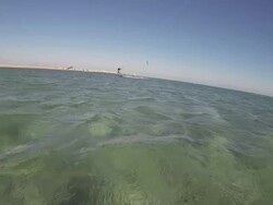 A woman kite surfing on the Red Sea in Egypt. - Slow Motion Stock Footage