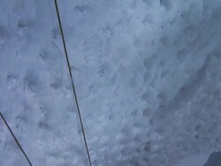 Male climber climbing ice using hooks Stock Footage