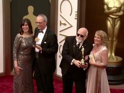 Peter W. Anderson & Charles "Tad" Marburg - 86th Annual Academy Awards - Arrivals Stock Footage
