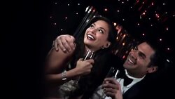 Hollywood couple in back of limousine smile for paparazzi at awards show Stock Footage