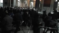 Court house up in flames during clashes between protesters and riot police News Clip