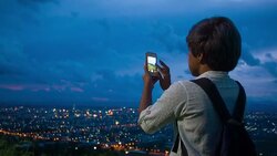 HD DOLLY : Asian woman using smartphone take a photo Stock Footage