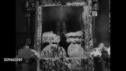 1937: SAVANNAH, GEORGIA: VS Machines making paper, watered rollers moving on paper, large machine w/ paper rolling over, under rollers. MS Dr Herty watching long paper sheet stretched. Instructional Video