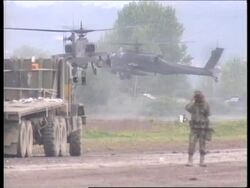 ALBANIA: NATO APACHE ATTACK HELICOPTERS AT TIRANA News Clip