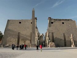 PINK GRANITE OBELISK AND FIRST PYLON OF LUXOR TEMPLE Stock Footage