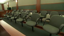 The chairs of a jury box are empty. Stock Footage