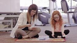 Speech therapist working with a little girl in a clinic Stock Footage