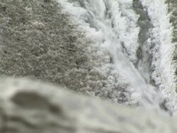CU of stream through ice on Huayna Potosi glacier in Andes region of Bolivia Stock Footage