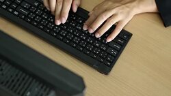Businesswoman typing and develop his project Stock Footage