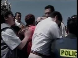 VOICED Protesters in clashes over Iraq and free trade News Clip