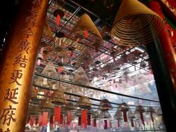 MS PAN Incense coils hanging from roof of Man Mo Temple / Hong Kong, Hong Kong, China Stock Footage