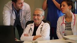 Professor and assistant doctor working on laptop Stock Footage