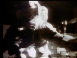 close up of astronaut jumping onto lunar rover on Moon Stock Footage