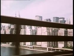 A car drives over the Queensborough Bridge away from Manhattan. News Clip