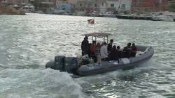 CLEAN : Flowers and misery on Italy's refugee ship News Clip