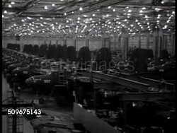 1942: NAVAL AIRCRAFT FACTORY: Women working on exterior of airplane, woman FG working w/ riveter, 'Rosie the Riveter', HA WS INT Warehouse filled w/ airplanes. Mechanics working on engines. VS Women working, interior, assembly, coating tubes.WWII Instructional Video