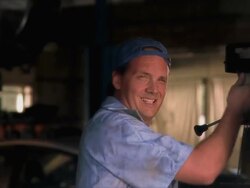 MS Mechanic opening garage door of auto repair shop / Tampa, Florida, USA Stock Footage