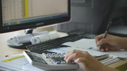 Female hand in Working Payroll workers. Calculation at office Stock Footage