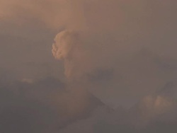 T/L video of mushroom cloud ash explosion from volcanic eruption, Philippines, Dec 2009 Stock Footage