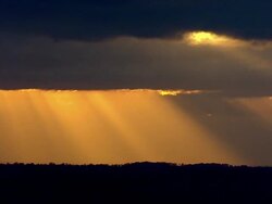 Rays Of Sun Through Clouds - Aerials News Clip