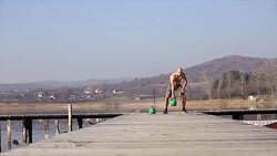Doing exercise with kettle Stock Footage