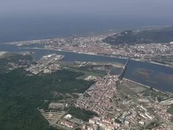 AERIAL WS Townscape with estuary of Limia River / Viana do Castelo, Portugal Stock Footage