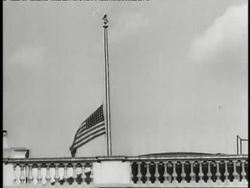 The American flag flies at half-mast on the roof of the White House upon the death of U.S. President Franklin D. Roosevelt. News Clip