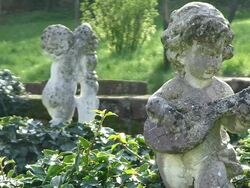 MS View of stone figurines in garden / Kastel-Staadt, Rhineland-Palatinate, Germany Stock Footage