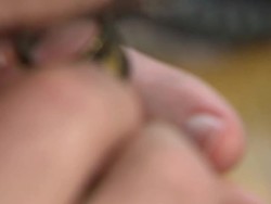 Dealer Inspecting Diamonds News Clip