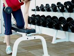 Woman exercising in gym Stock Footage