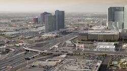 Traffic moves on an interstate running parallel to Las Vegas Boulevard. Stock Footage