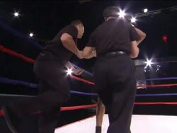 LA WS Boxer jumping around ring with his trainers, then one man lifts him up / Jacksonville, Florida, USA Stock Footage