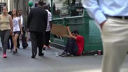 Homeless On Wall Street - Young Man Stock Footage