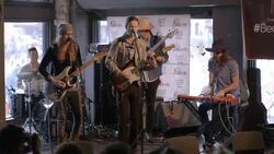 Rock band plays concert in crowded Austin bar during South By Southwest music festival Stock Footage