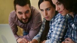 Two beautiful girls and man with laptop device Stock Footage