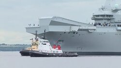HMS Queen Elizabeth, the Royal Navy's new aircraft carrier, leaves dock to begin sea trials News Clip