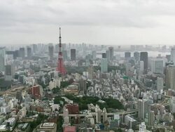 WS T/L View of Tokyo tower and Tokyo bay before upcoming typhoon / Tokyo, Japan Stock Footage