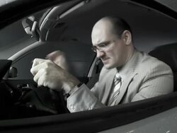 HD DOLLY: Angry Driver In a Car Garage Stock Footage