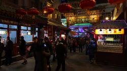 China, Beijing, Food stalls in Wanfujing Dajie Street, Beijing's main shopping street at night Stock Footage