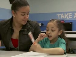 Kids at American Heart Association Teaching Gardens Planting in Harlem Stock Footage