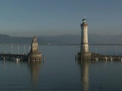 WS T/L View of Lindau harbour entrance and lighthouse at Lake Constance / Lindau, Bavaria, Germany  Stock Footage