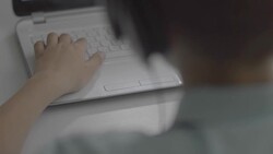 little boy playing on the computer games Stock Footage