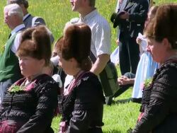 MS Pilgrimage of societies for traditional costumes at abbey Maria Eck near Siegsdorf, Chiemgauer Alps / Siegsdorf, Bavaria, Germany Stock Footage