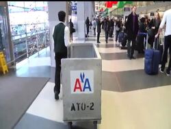 The parent company of American Airlines filed for bankruptcy protection Tuesday, seeking relief from crushing debt caused by high fuel prices and expensive labor contracts that its competitors shed years ago. News Clip