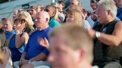 Stadium crowd cheers at sporting event Stock Footage