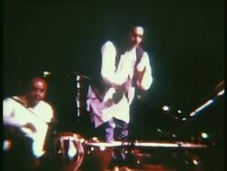 1969 MONTAGE WS ZI Ravi Shankar walking onstage with sitar and bowing to the crowd before playing at Woodstock music festival/ Bethel, New Yorl, USA Stock Footage