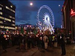 Greenpeace stage stunt; Danish climate change protest; Iranian protest News Clip