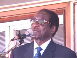 President speaks at airport after return from AU meeting; crowds News Clip