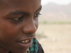 Boy's face with pointed teeth Stock Footage